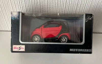 Maisto escala 1/33 - Diecast 21103 Smart Coupe - Motorizado - Rojo/Negro Foto 1 de 4