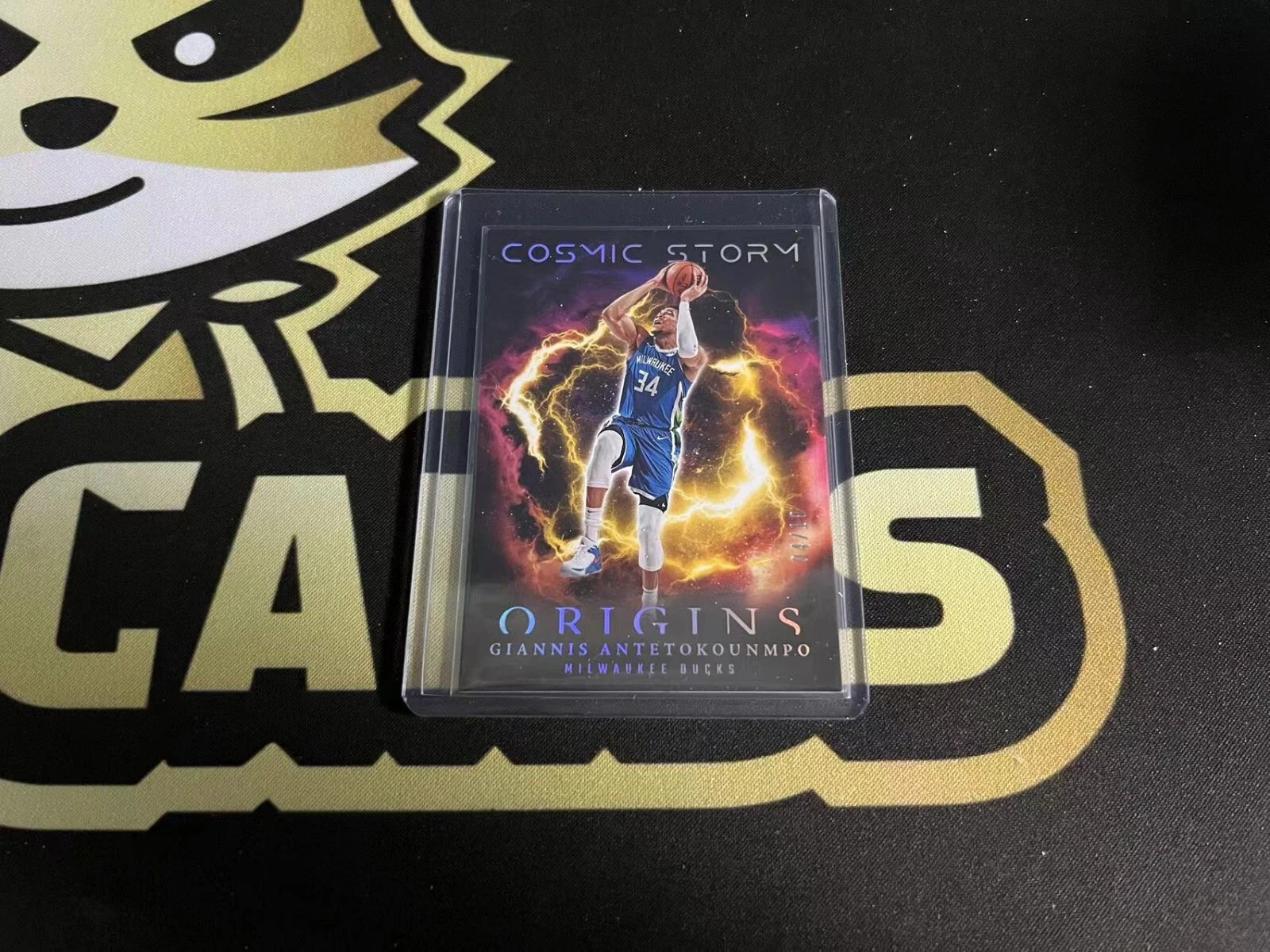 2023-24 Panini Origins Basketball Cosmic Storm Gold #Giannis Antetokounmpo 04/10
