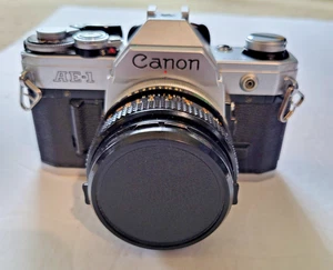 Vintage Canon AE-1 Program analoge 35-mm-Spiegelreflexkamera FD 50 mm f/1,8 Objektiv getestet - Bild 1 von 18