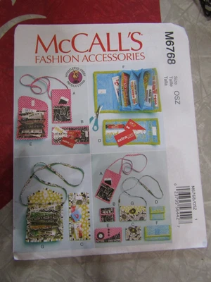 Vintage UNCUT McCall's 7 PURSES WALLETS & COUON CLUTCHES Sewing PATTERN #6768 - Image 1 of 2