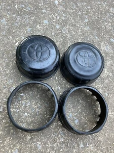 (4) pressed steel wheel center caps older Toyota 4WD 09142406 - Picture 1 of 6