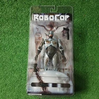 FIGURA DE AÇÃO ROBOCOP / BATALHA DANIFICADA / 25º ANIVERSÁRIO / BRINQUEDOS DE MOLINETE NECA LER  - Imagem 1 de 4