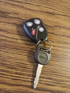ORIGINAL GMC ENVOY XUV 02-09 OEM KEY LESS ENTRY REMOTE FOB 4-BUTTON MEMORY-2 US - Picture 1 of 2