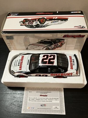 RARE 2010 BRAD KESELOWSKI DISCOUNT TIRE TEAM PENSKE DODGE CHARGER CHECKERED FLAG - Image 1 of 4