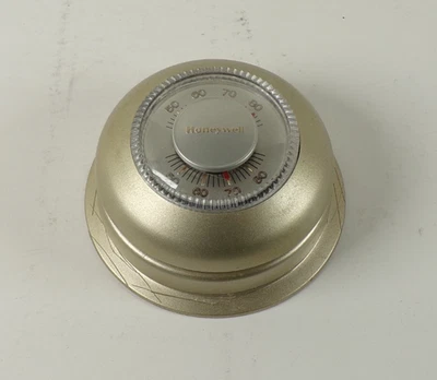 Termostato redondo de calefacción y refrigeración Honeywell T87F de colección Foto 1 de 4