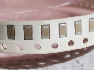 KOA Spear X7R1206HTTD104K Fixed Multilayer Ceramic Capacitors - Picture 1 of 1