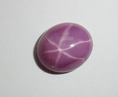 Opaque Star Ruby Oval 12x10 mm Cabochon 6 Rayed Lab-created Stone 1 piece Lot - Image 1 of 4