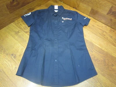 CAMISA DE COLECCIÓN UHC PRO CYCLING TEAM MANGA CORTA TIENDA DE CICLISMO por TYR - M - AZUL MARINO Foto 1 de 4