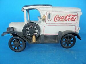 VINTAGE CAST IRON COCA COLA DELIVERY TRUCK WITH STEERING WHEEL AND SPARE TIRE