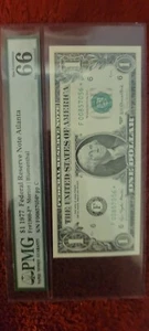 FR. 1909-F* 1977 $1 *STAR* FEDERAL RESERVE NOTE ATLANTA,GA PMG GEM UNC-66EPQ - Picture 1 of 4