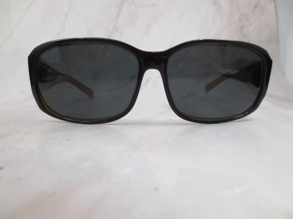 Gafas de sol Paul Frank con montura para mujer de plástico negro mate borde completo de gran tamaño Foto 1 de 4