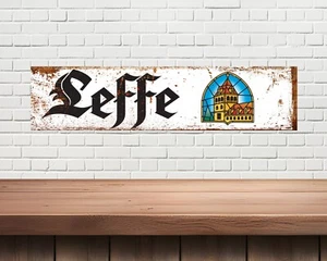 Letrero de metal Leffe, cueva del hombre, cabaña de cerveza, letreros de pared, bar en casa, letreros de cerveza, garaje - Imagen 1 de 1