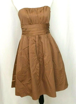 VESTIDO FORMAL DAVID'S NOVIA BRONCEADO LATTE 6 BOLSILLOS HASTA LA RODILLA SIN MANGAS AJUSTE ACAMPANADO Foto 1 de 4