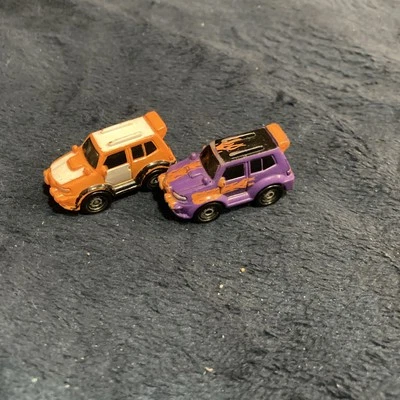 Small Hasbro Micro Machine SUV Purple & Orange Flames & Orange SUV Bundle Lot - Image 1 of 4