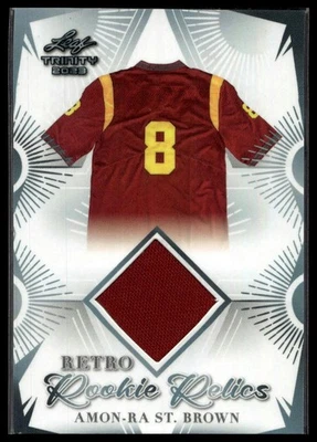 2023 Leaf Trinity #RRR-1 Amon-Ra St. Brown Retro Rookie Relics MEM - Image 1 of 2