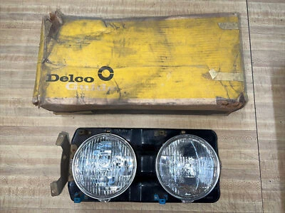 Faros Chevy Impala Biscayne Bel Air T-3 1964 con carcasa NOS 5955011 I69 Foto 1 de 4