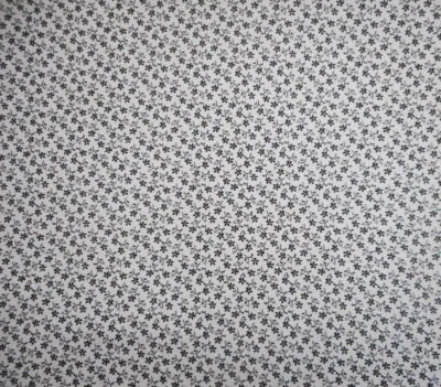 Tela de reproducción de la Guerra Civil por yarda pequeña negra floral sobre algodón beige Foto 1 de 2