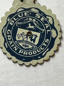Vintage Schlüsselanhänger blaues Siegel Futter Werbung 21 Jahre drehbar ewiger Kalender - Bild 1 von 2