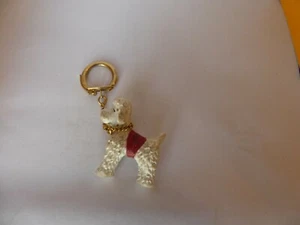 PORTE CLÉ PLASTIQUE CANICHE BLANC - Imagen 1 de 2