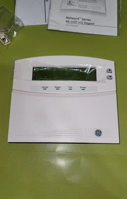 Interlogix GE Security Caddx NetworX NX-148E LCD 键盘带 GE 标志 全新! — 第 1/4 张图片