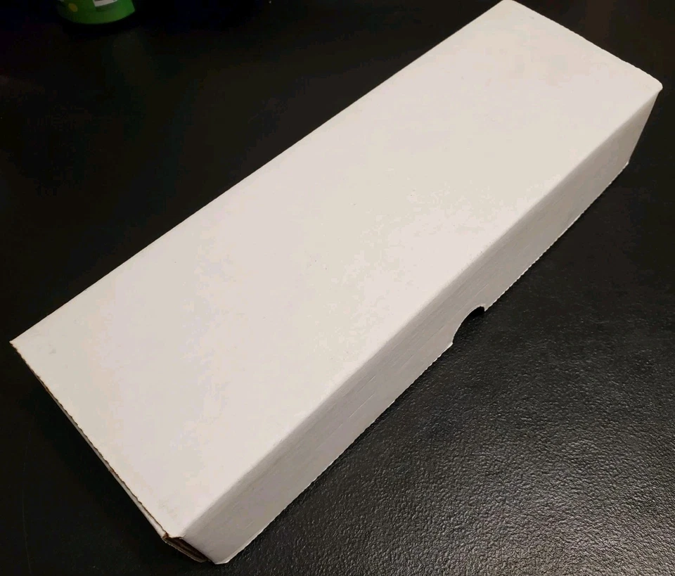 ULINE U-Line S-10704  12" x 4" x 2" White Indestructo Mailers Bundle 100 Boxes - Image 1 of 4