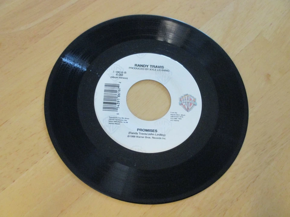 RANDY TRAVIS - PROMISES  B/W - AN OLD PAIR OF SHOES VG++, LIKE NEW, 1988  - Image 1 of 1