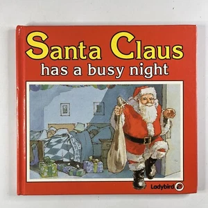 Santa Claus Has a Busy Night Hardcover Kids Christmas Eve Book Lynne Bradbury - Picture 1 of 14