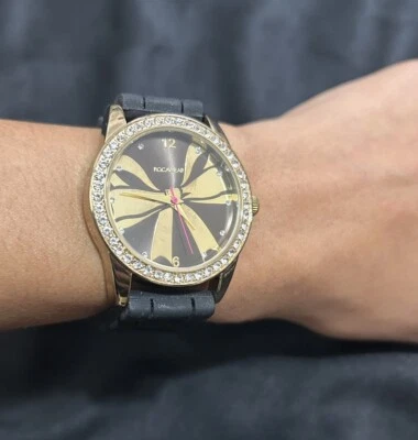 Rocawear Wrist Watch Women’s Black Quartz Movement Bow Round Parts Only - Image 1 of 4