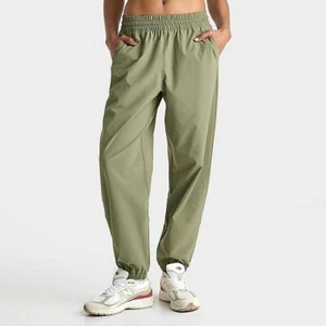 New Balance Athletics Stretch Woven Womens Jogger Pants Olive Green L NWT $100 - Picture 1 of 6