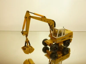CONRAD 2822 LIEBHERR 912 BAGGER EXCAVATOR - YELLOW 1:50 - GOOD CONDITION - Imagen 1 de 10