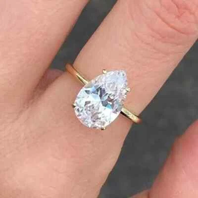 Anillo solitario para mujer de diamantes talla pera creado en laboratorio de 2 quilates enchapado en oro amarillo de 14 quilates Foto 1 de 4