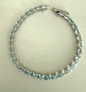 JTV  Blue Topaz Sterling & Rhodium Tennis Bracelet 8"  DK Juan Guarov Designer - Picture 1 of 3