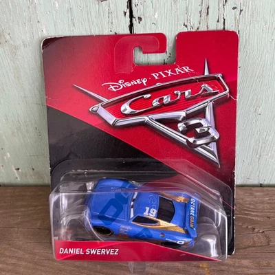 DISNEY PIXAR CARS 3 DANIEL SWERVEZ #19 MATTEL CAR NEW IN SEALED PACKAGE - Image 1 of 4