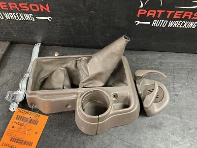 01-04 TOYOTA TACOMA CONSOLA PISO CENTRAL DELANTERA CON SOPORTES Foto 1 de 4