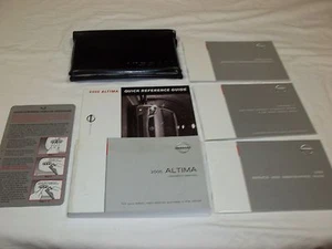 Nissan Altima 2005 juego manual de 7 piezas y estuche Nissan triple plegable negro de fábrica - Imagen 1 de 5