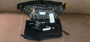 Dolce&Gabbana Nylon belt bag with leopard ๐ print against a green background - Picture 1 of 12