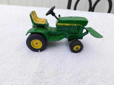 ERTL John Deere JD 140 Lawn & Garden tractor with blade one lever factory miss m - Image 1 of 4