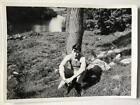 Vintage photo young man sitting at tree sensitive guy gay interest Handsome
