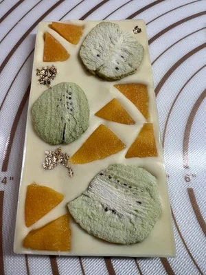 White Chocolate Bar fruit nuts Sweet taste topped Kiwi Mango & Gold 100g . - Image 1 of 4