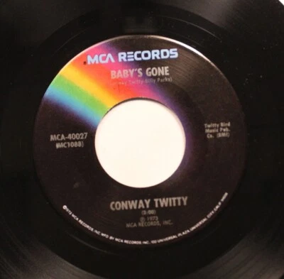 Country 45 Conway Twitty - Baby'S Gone / Dim Lonely Places On Mca Records - Image 1 of 2