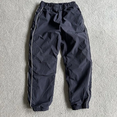 Kids 7-8 Uniqlo Nylon Pants With Fleece Lining Navy With Reflective Piping - Image 1 of 4