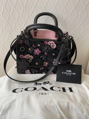 [Como Nuevo] COACH 87065 Rogue 25 Tea Rose Negro Rosa Guante Cuero Guijarro Curtido Foto 1 de 4