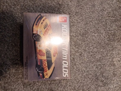 Vintage Amt Kodak Film Olds. 1/25 Scale Car Model Kit Brand New At34 Years... - Image 1 of 4