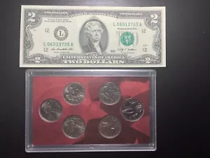 2009 territory quarters and A 2009 two dollar bill - Picture 1 of 2