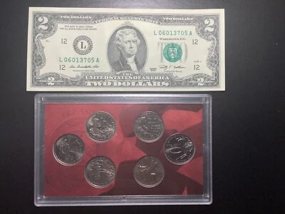 2009 territory quarters and A 2009 two dollar bill - Image 1 of 2