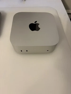 Neuwertiger Apple Mac Mini M4 512GB SSD 16GB RAM Silber + Tastatur Logitech - Bild 1 von 4