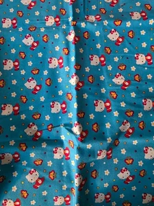 Baumwollstoff. Hello Kitty auf blau. Vorgeschnitten bei 1yd x 42" - Bild 1 von 1