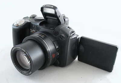 Canon PowerShot S5 IS 8MP Digital Camera 12x Optical Zoom See Photos/Description - Image 1 of 4