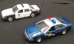 2 Nevada 1:43 PRESSOCAST POLICE CARS - Road Champs & Toysmith Pullback Crash Action - Foto 1 di 9