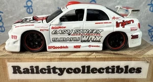 SUBARU WRX 2001 MUSCLE TUNERS 1:64 MUSCLE MACHINES (defekter Flügelspoiler) siehe Bilder - Bild 1 von 12